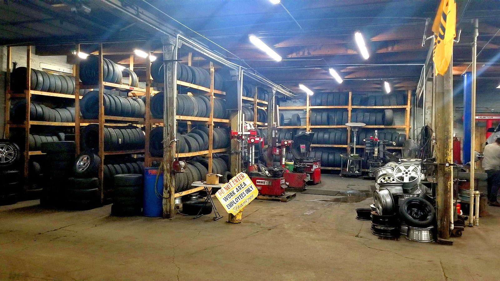 Tire racks and mounting machines